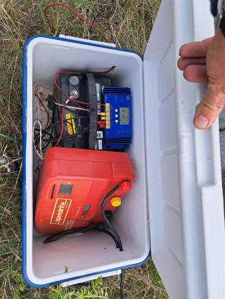 Cooler serves to protect fencer and battery from the elements - waterproof and vermin proof.