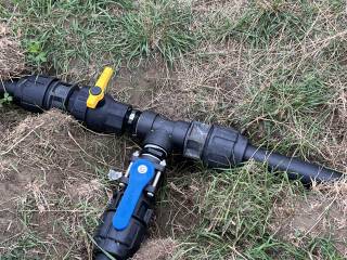 Underground pipeline with connection valves that can be turned on and off and blown out before winter freeze up.